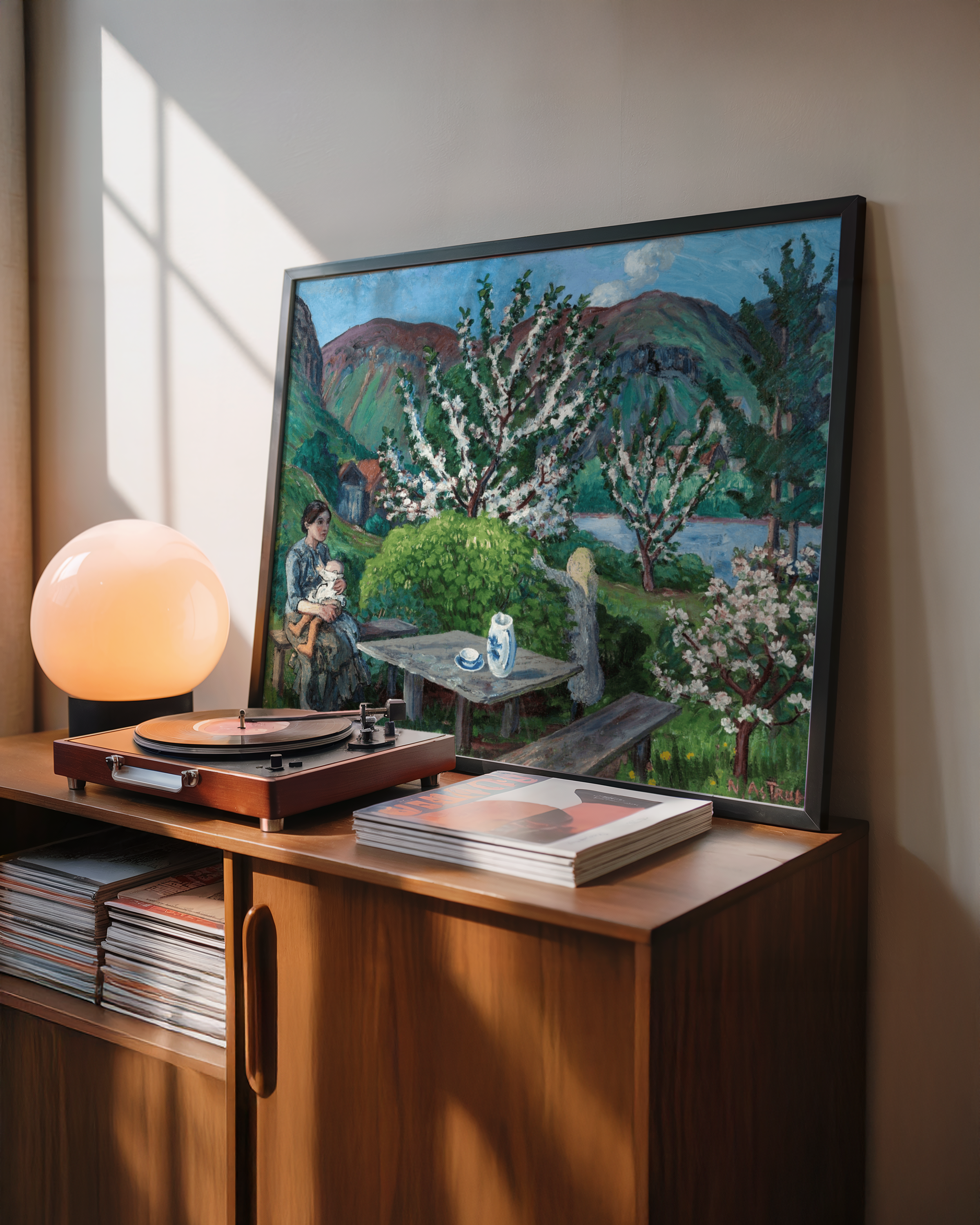 Nikolai Astrup - Mor og barn ved hagebordet