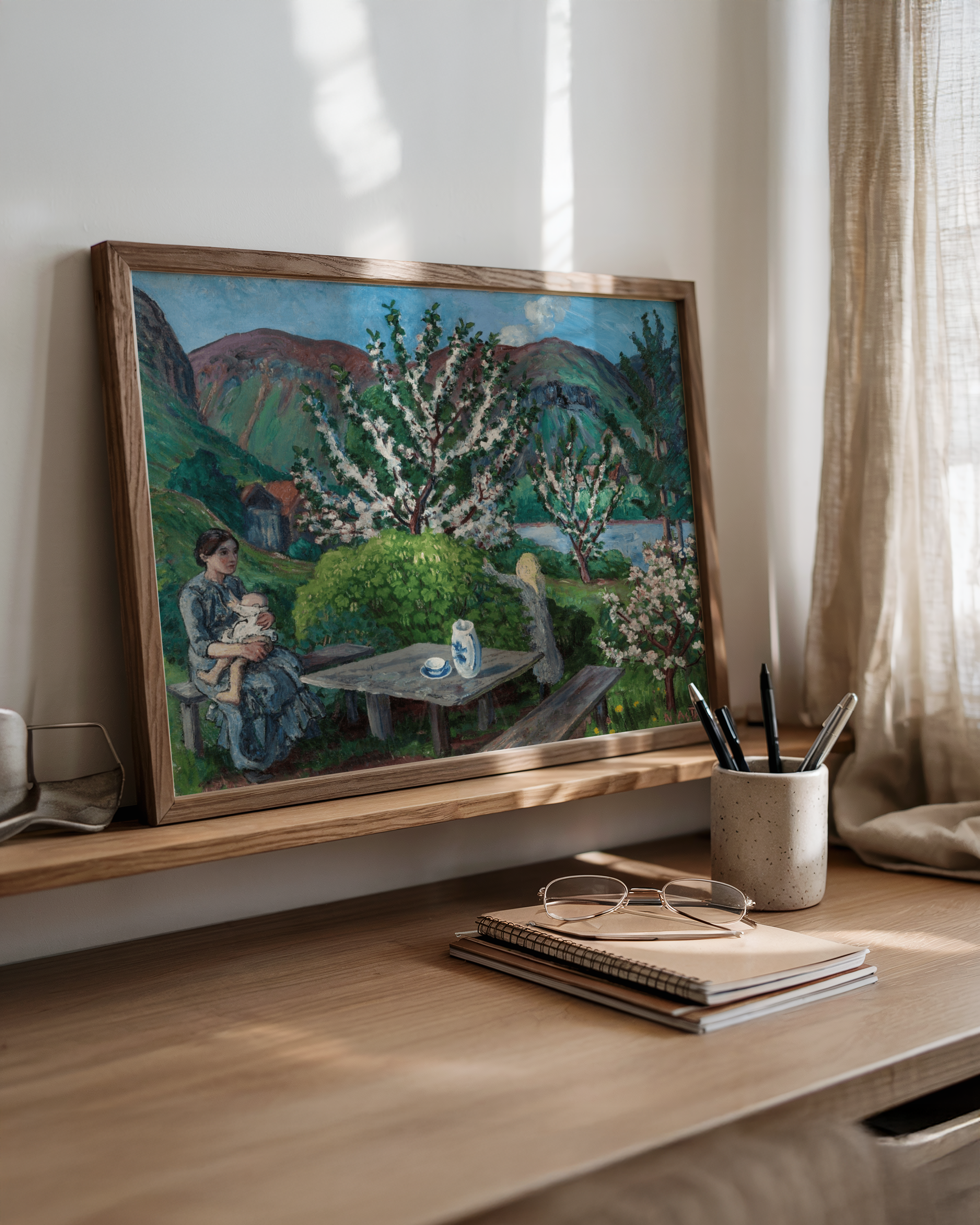 Nikolai Astrup - Mor og barn ved hagebordet