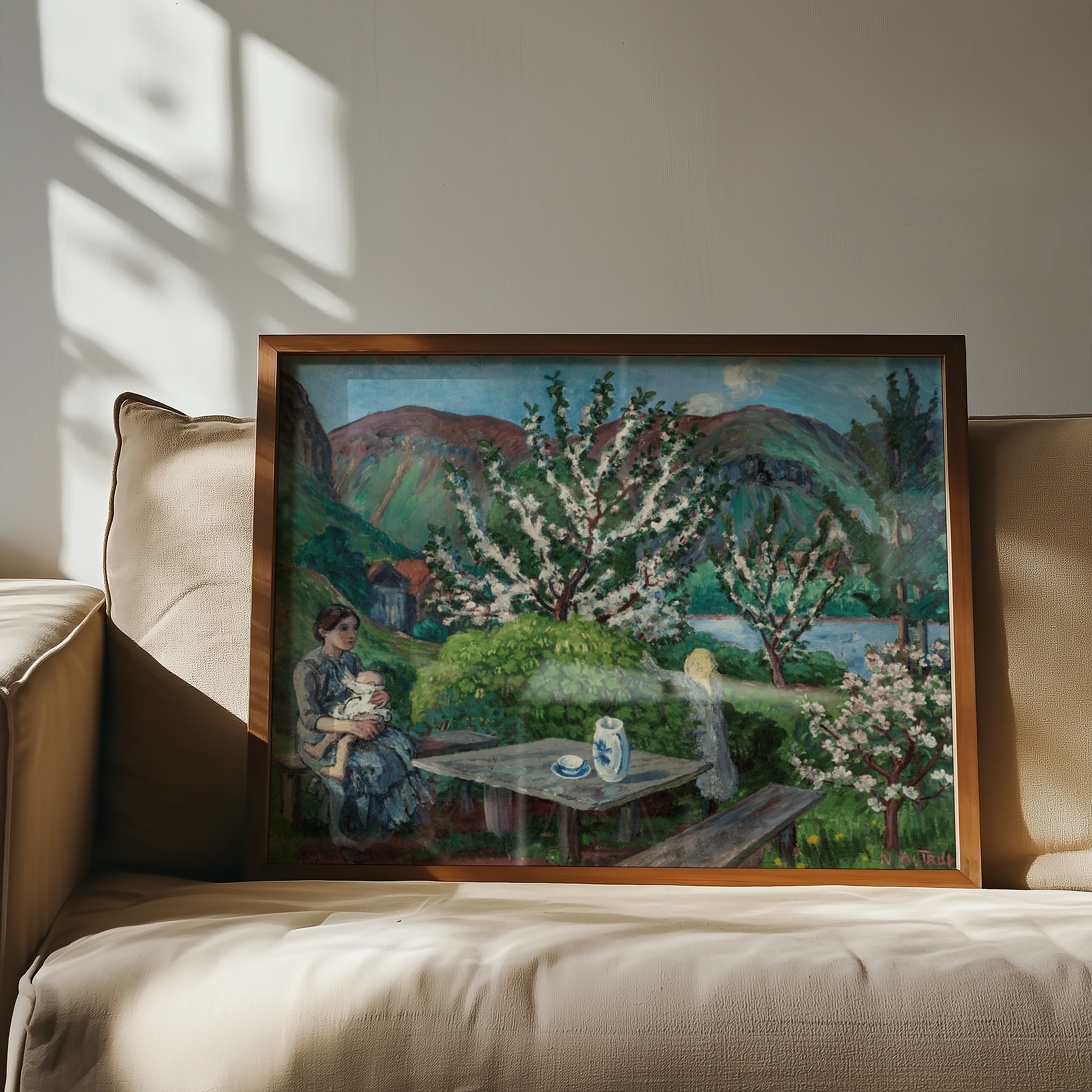 Nikolai Astrup - Mor og barn ved hagebordet